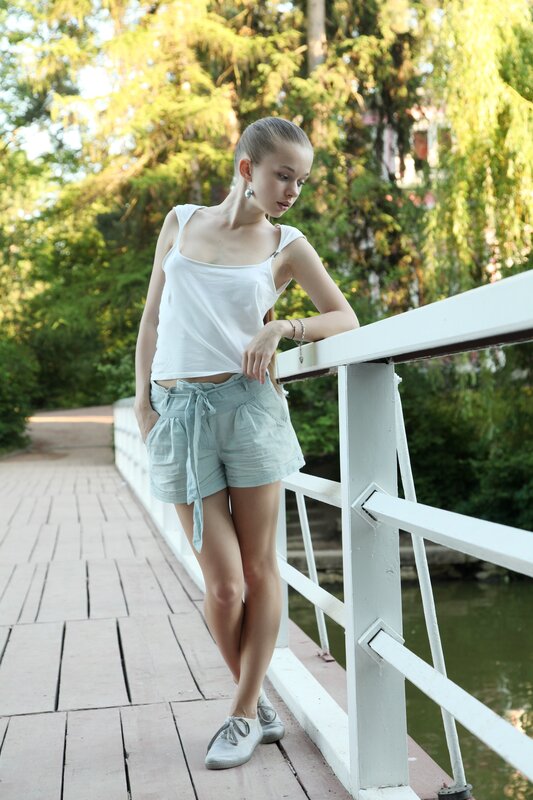 Woman on a bridge in summer
