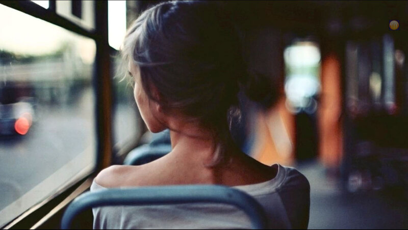 Woman on a Bus — Gray