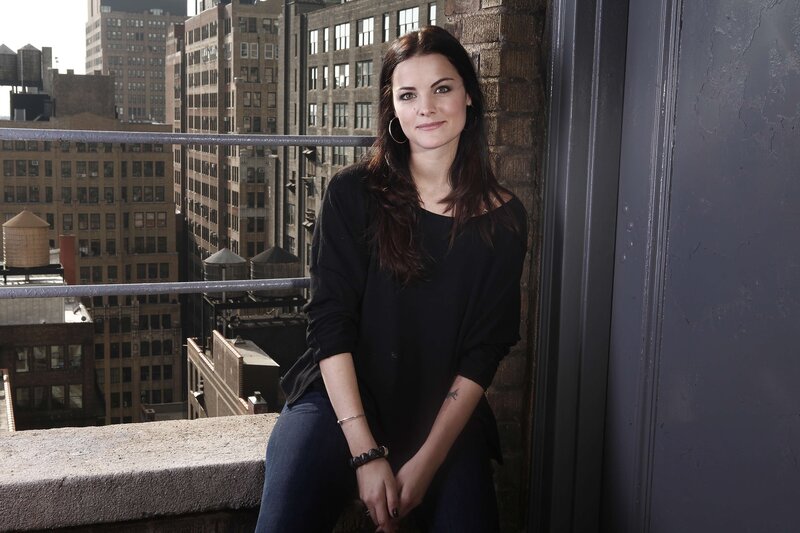 woman on a city rooftop