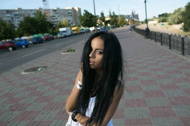 woman on a city sidewalk