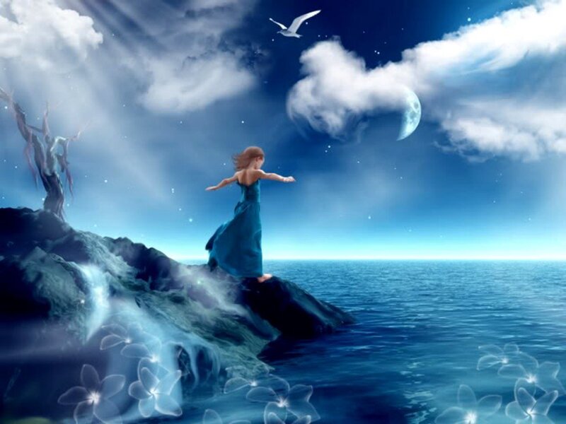 woman on a cliff at night