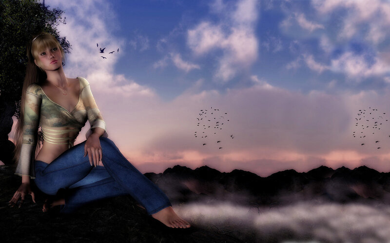 Woman on a cliff at sunset
