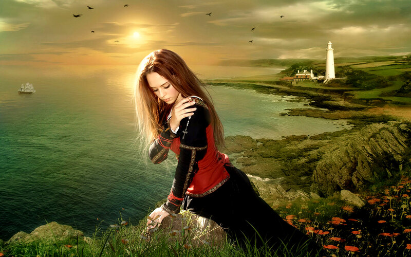 woman on a cliff at sunset