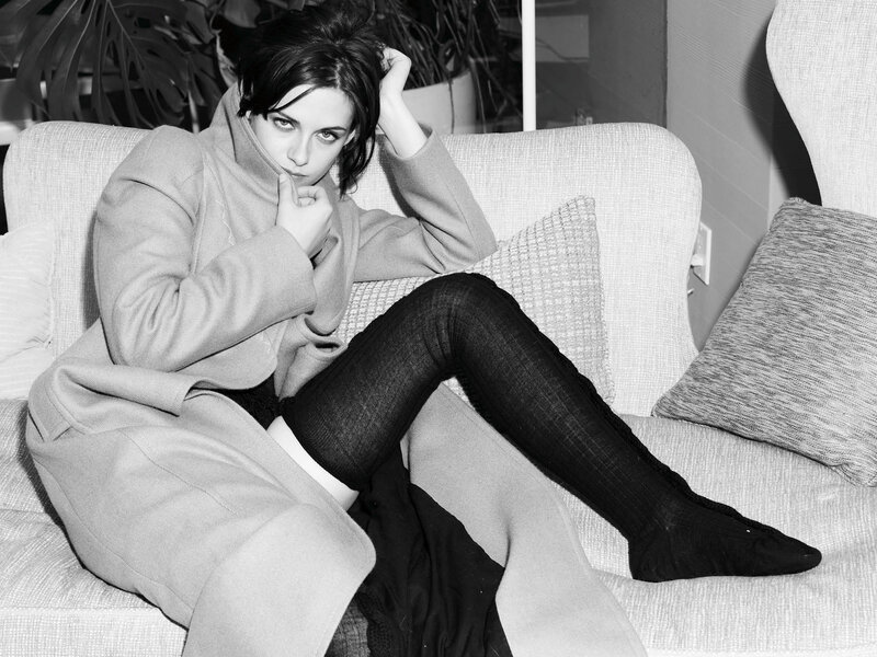 Woman on a Couch — Black, Serious