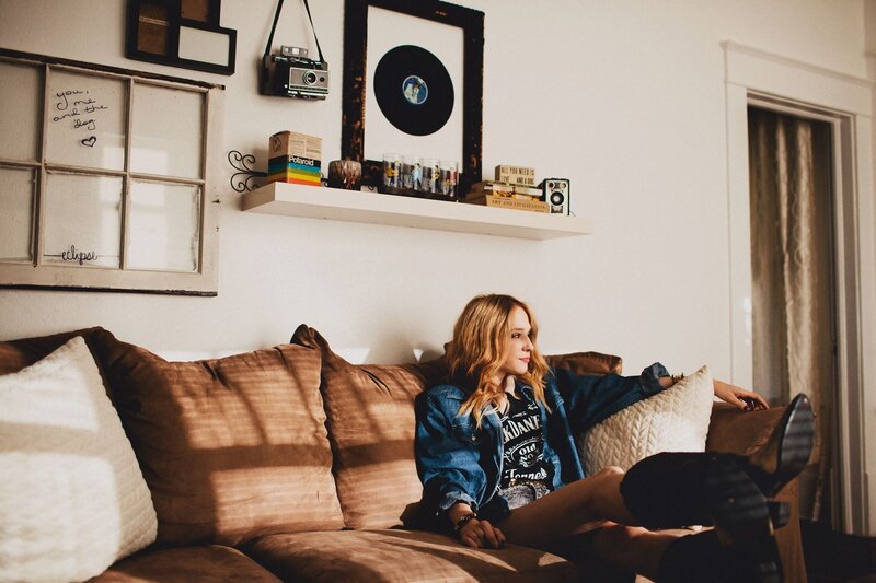 Woman on a Couch — Brown, Relaxed, Afternoon, Photograph, Shelf