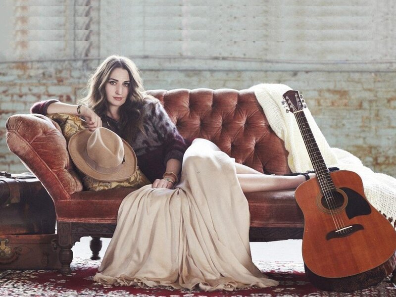 Woman on a Couch — Brown, Relaxed, Photograph, Guitar