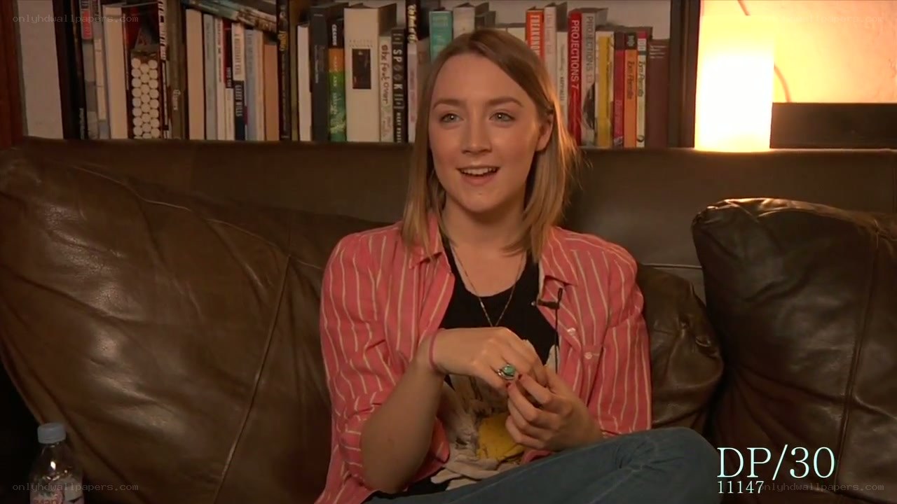 woman on a couch speaking