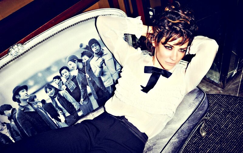 Woman on a Couch — White, Dramatic, Photograph