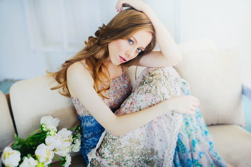 Woman on a Couch — White, Serene