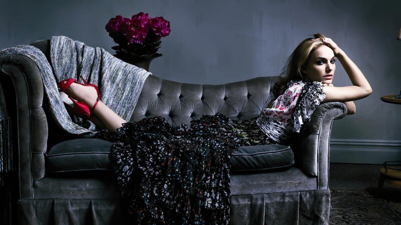 woman on a couch with flowers