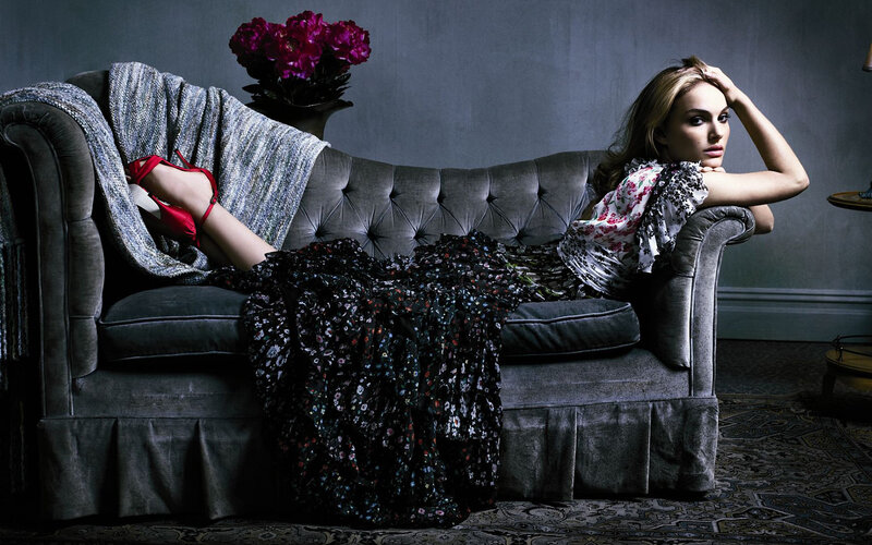 woman on a couch with flowers