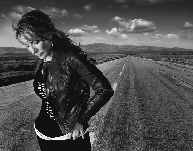 Woman on a desert road