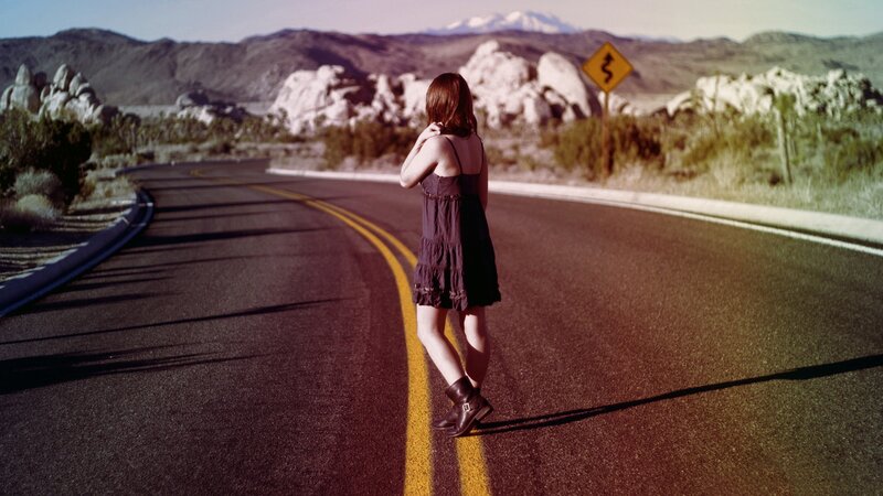 woman on a desert road
