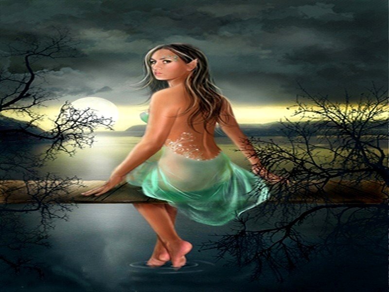 Woman on a dock at night
