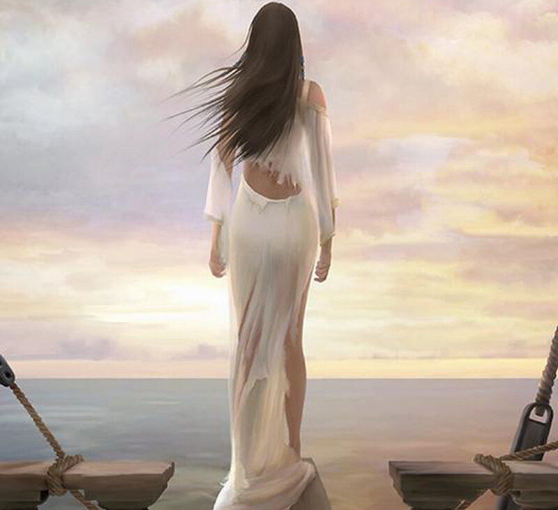 Woman on a dock at sunset