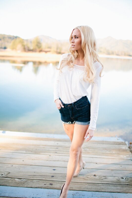 woman on a dock by the lake