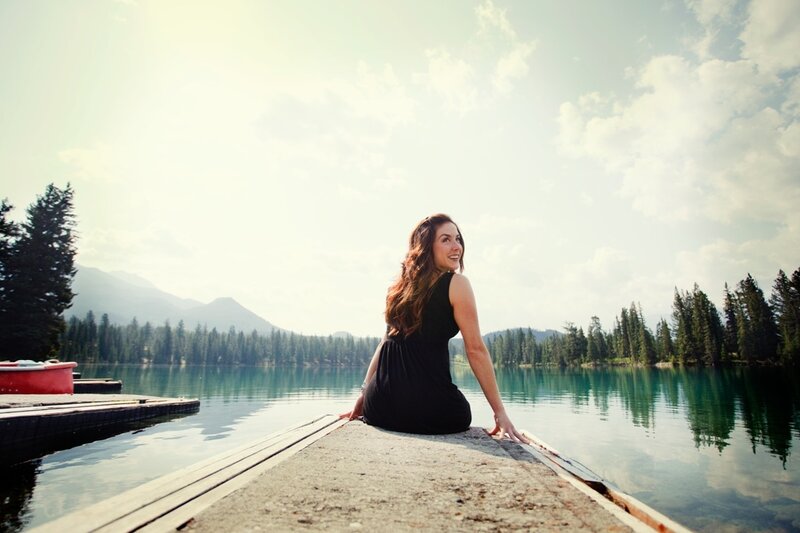 Woman on a dock by the lake
