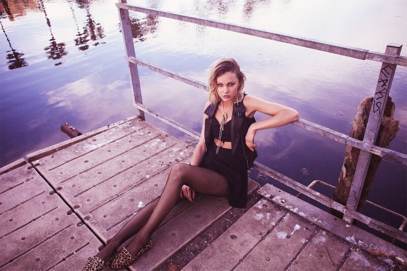 woman on a dock by water