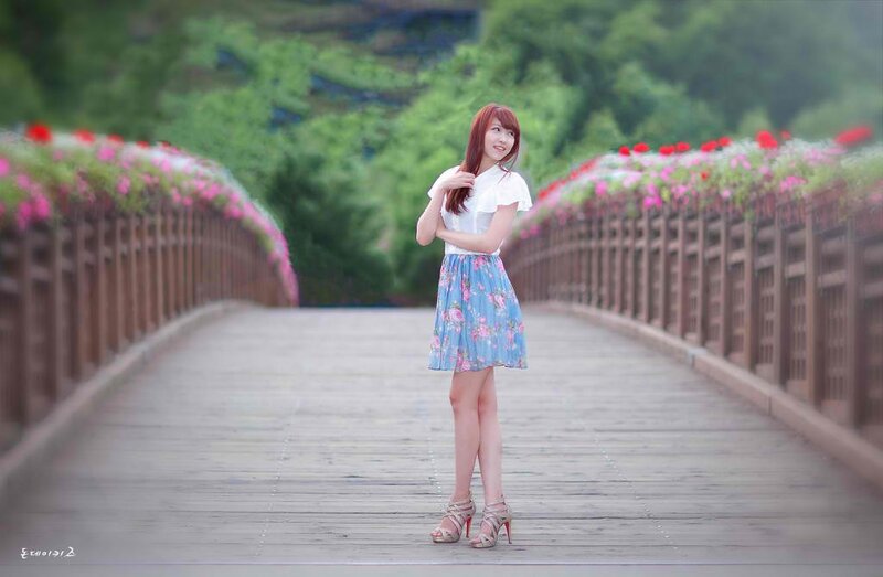 Woman on a flower bridge