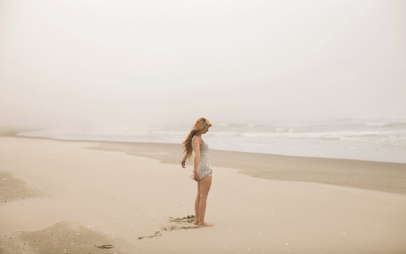 woman on a foggy beach