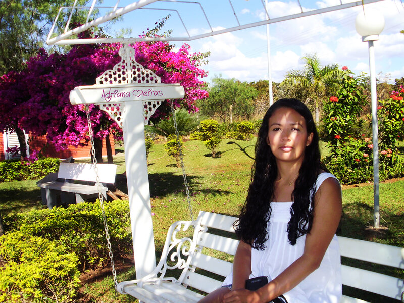 Woman on a garden swing