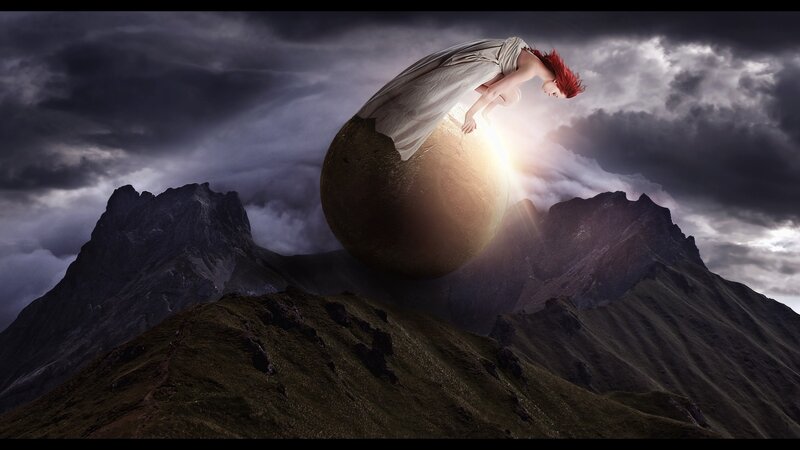 woman on a glowing sphere