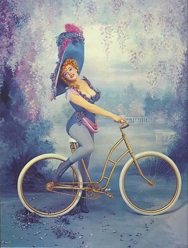 Woman on a golden bicycle