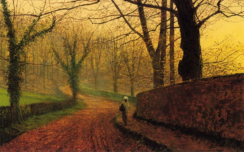 Woman on a leaf-covered path