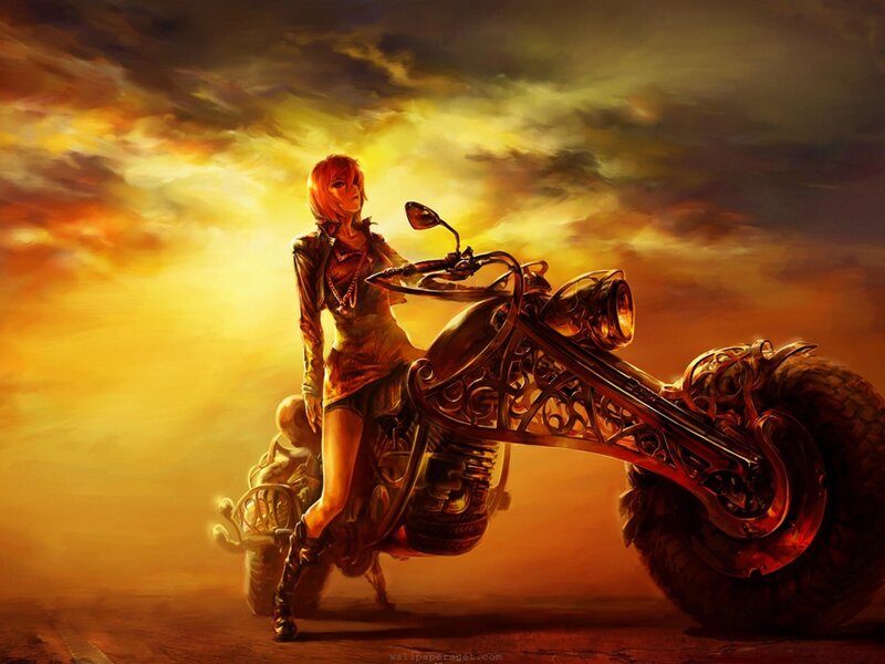 woman on a motorcycle at sunset