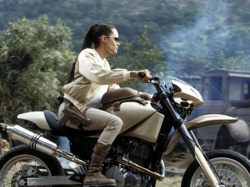 Woman on a motorcycle in action
