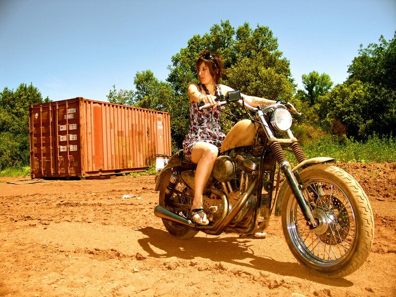 Woman on a motorcycle outdoors