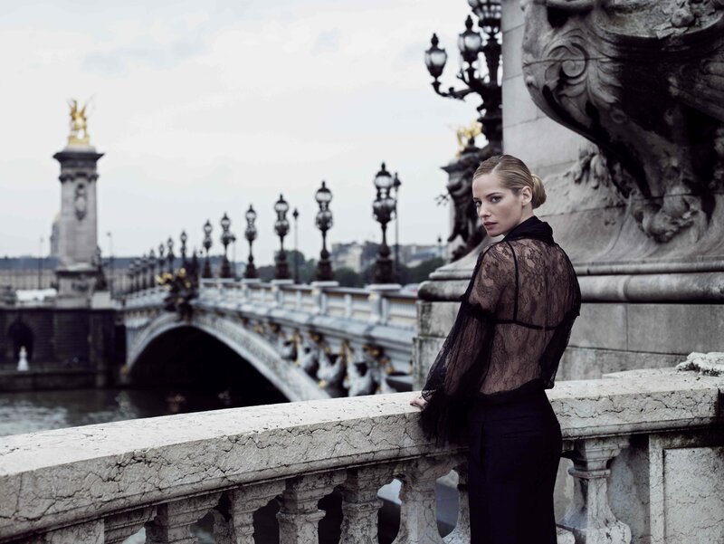 Woman on a Paris bridge