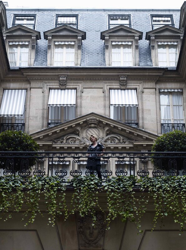 Woman on a Parisian balcony