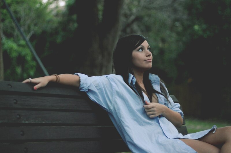 woman on a park bench