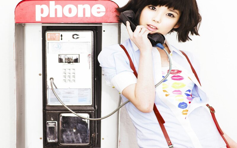woman on a payphone
