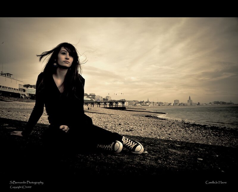 Woman on a pebble beach