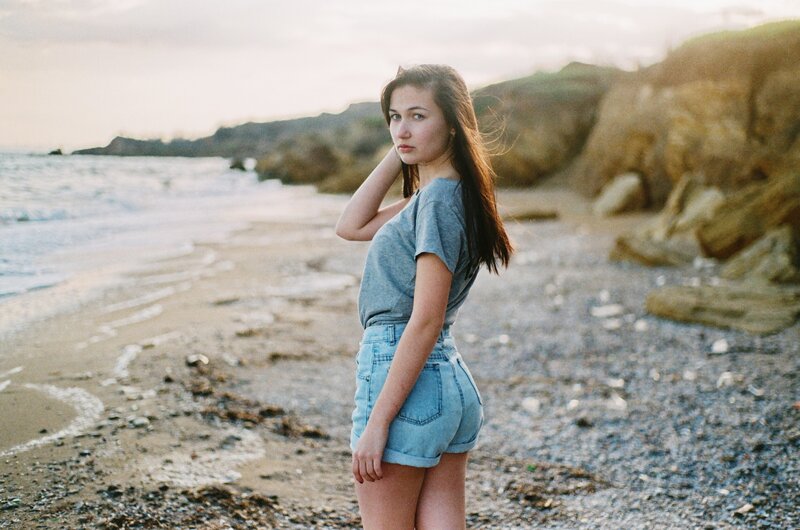 woman on a pebble beach