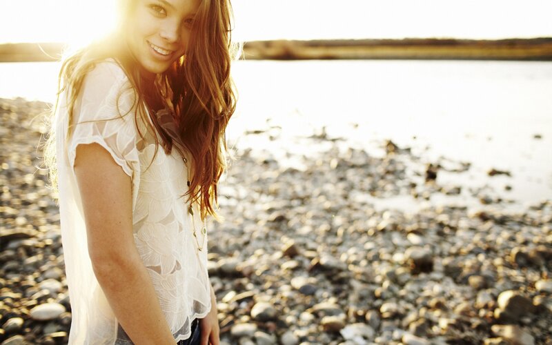 woman on a pebble beach
