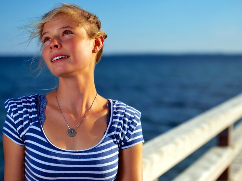 Woman on a Pier — Blue, Serene, Afternoon, Photograph, Ocean