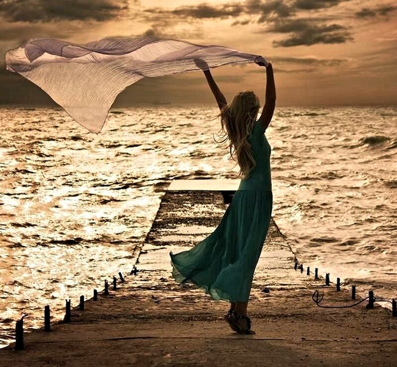 Woman on a Pier — Gold
