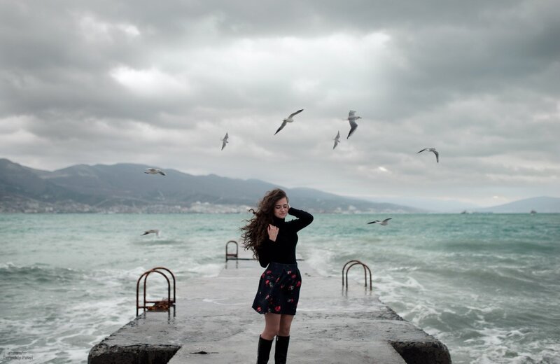 Woman on a Pier — Gray, Dramatic, Photograph