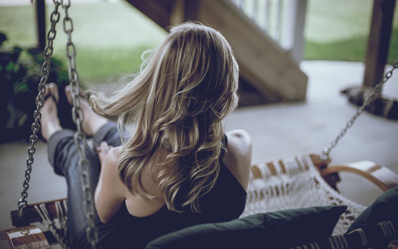 woman on a porch swing