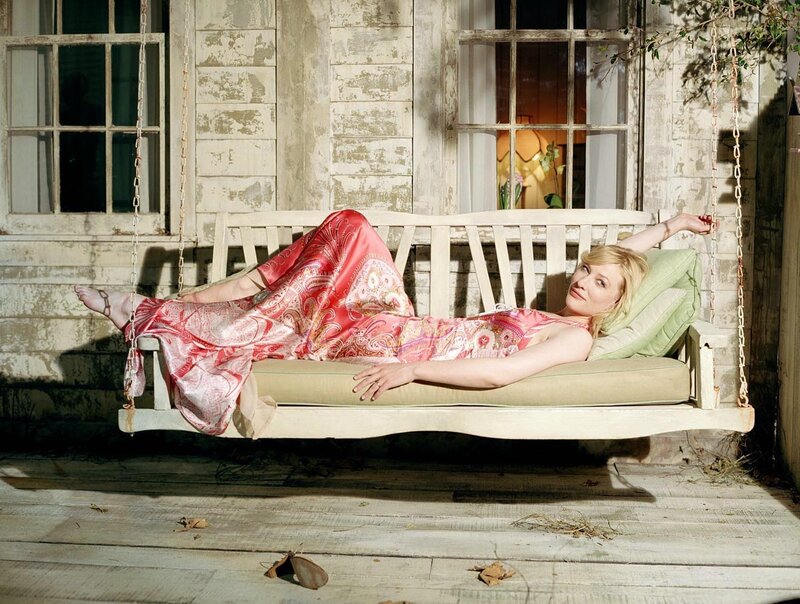 Woman on a porch swing