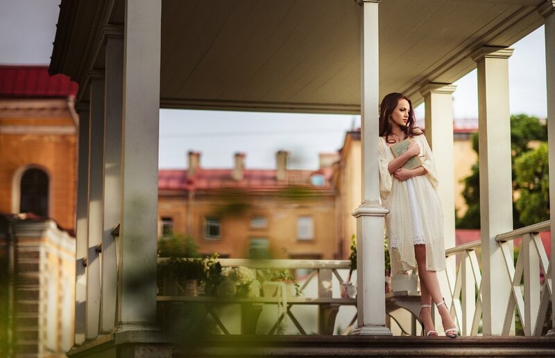 Woman on a Porch — White