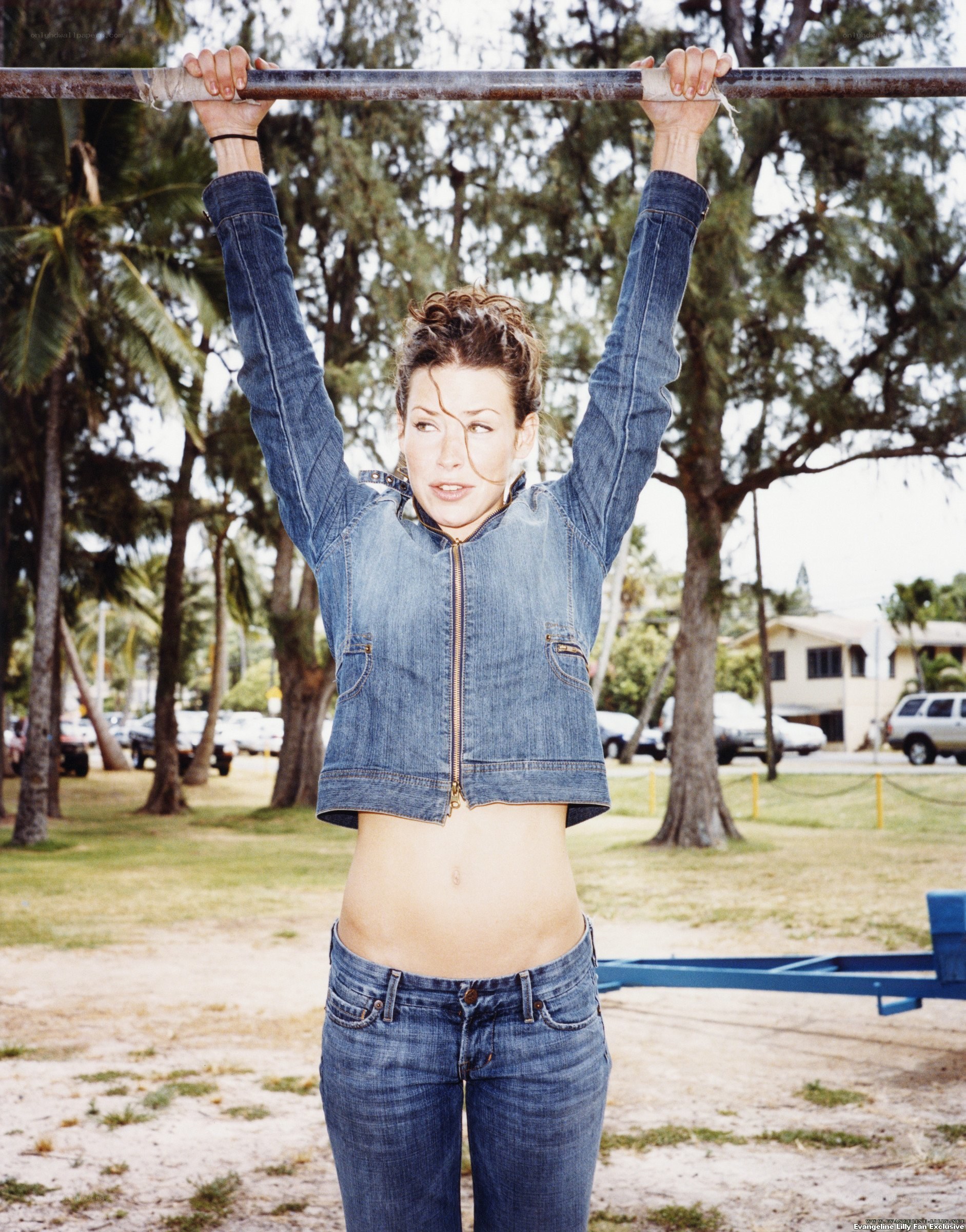 woman on a pull-up bar