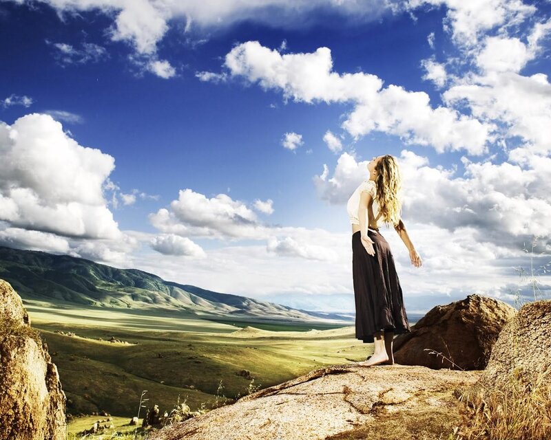 Woman on a Rock — Blue, Serene, Afternoon, Photograph, Mountains, Clouds