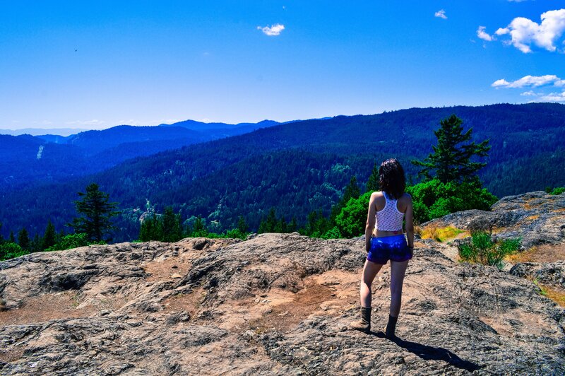 Woman on a rocky cliff