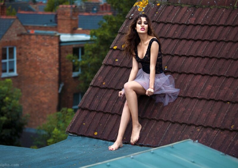 Woman on a Roof — Brown