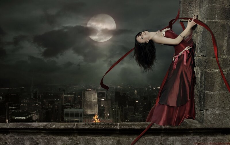 woman on a rooftop at night
