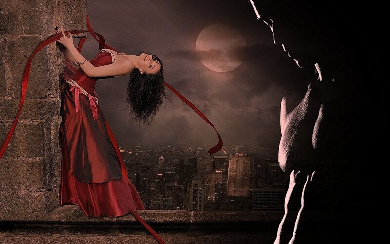 Woman on a rooftop at night